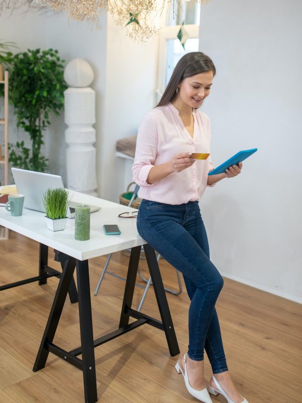 nice-positive-woman-entering-her-bank-card-number.jpg nice-positive-woman-entering-her-bank-card-number.jpg
